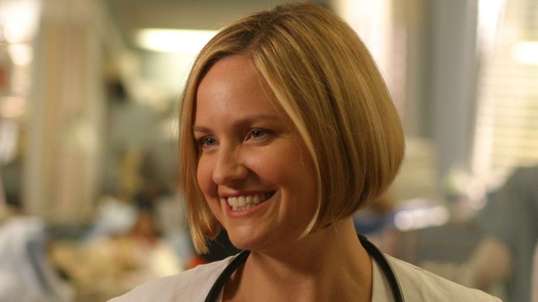 Sherry Stringfield as Susan Lewis smiles in ER