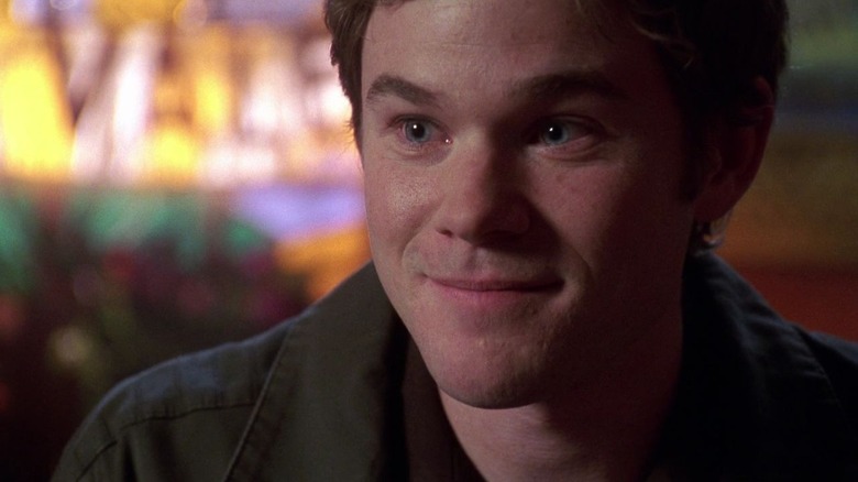 Aaron Ashmore as Jimmy Olsen close-up smiling in Smallville