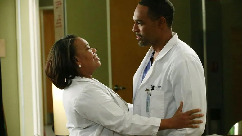 Miranda Bailey (Chandra Wilson) smiles holding Ben Warren (Jason George) in Grey's Anatomy