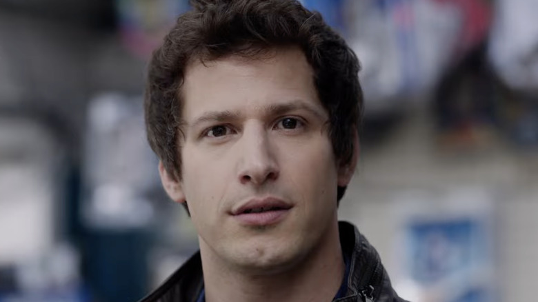Andy Samberg as Jake Peralta staring into the camera in Brooklyn 99