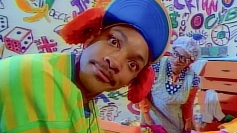 Will Smith looking at the camera while Vernee Watson-Johnson as his mom stares in the Fresh Prince of Bel-Air's intro
