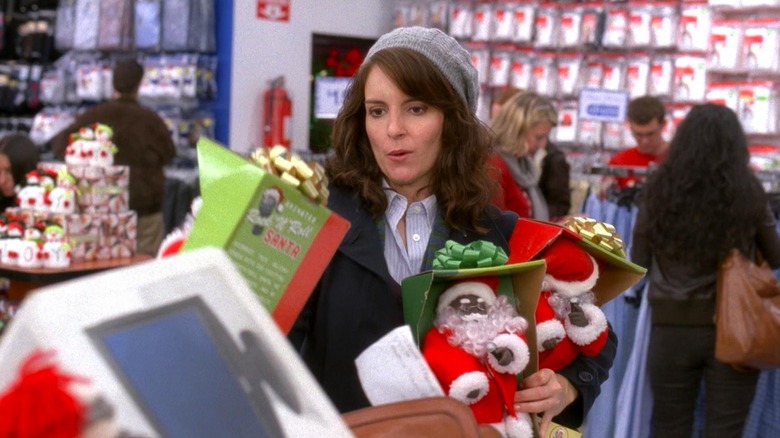 Liz Lemon (Tina Fey) buying gifts in 30 Rock