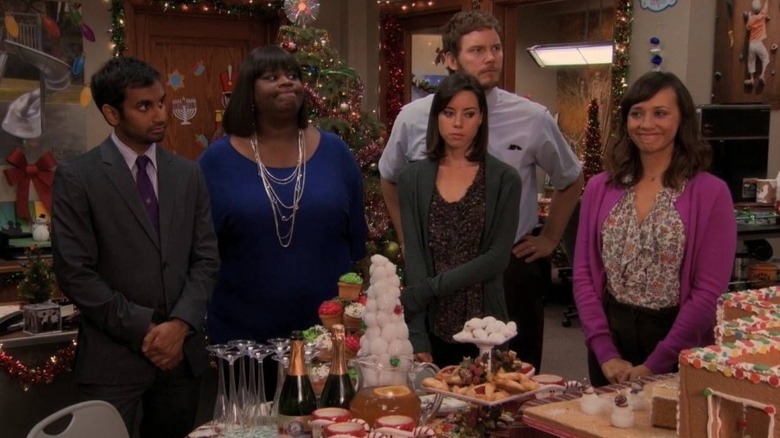 The Parks department standing together in Parks and Recreation