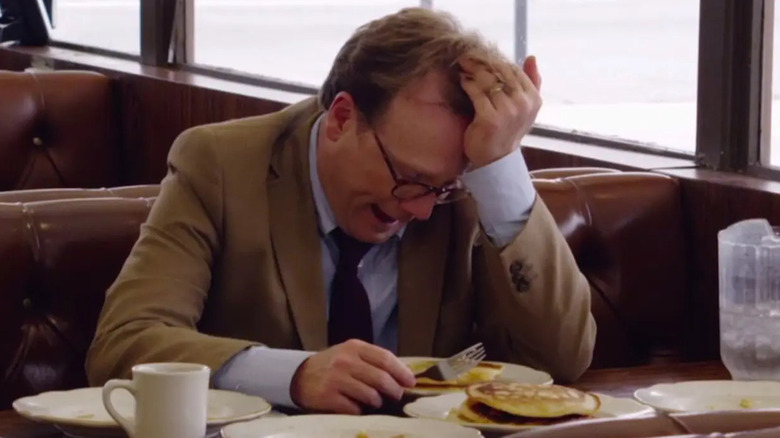 Forrest MacNeil (Andy Daly) tries to eat a bunch of pancakes in Review