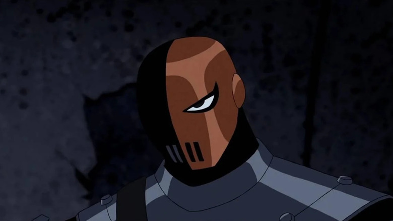Slade glares through his mask in Teen Titans.