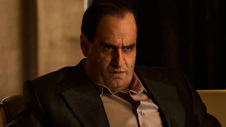 Colin Farrell as Oz Cobb, appearing concerned in The Penguin.