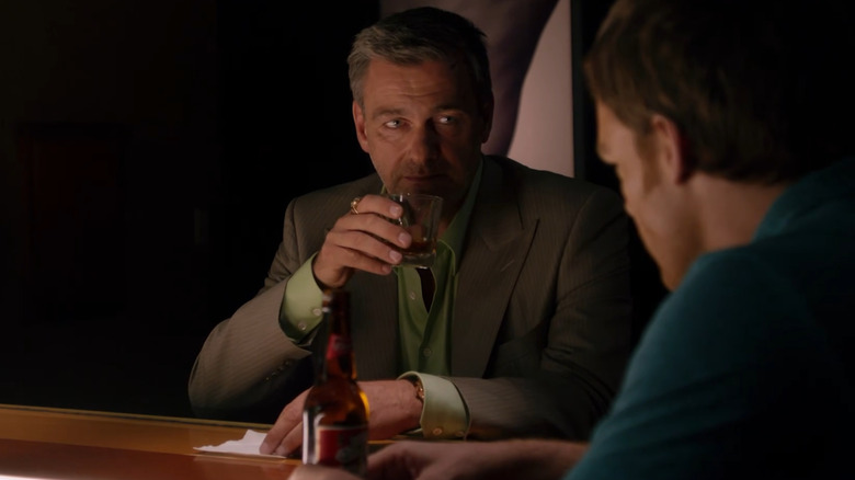Ray Stevenson as Isaak Sirko, sharing a drink with Dexter in Dexter.