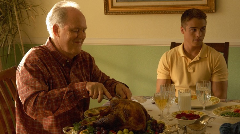 John Lithgow and Brando Eaton as Arthur and Jonah Mitchell, dining together in Dexter.
