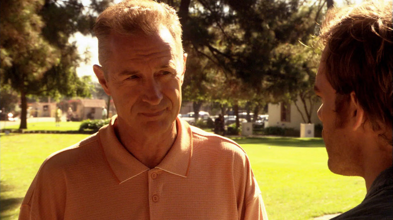Geoff Pierson as Thomas Matthews, talking to Dexter on a golf course in Dexter.