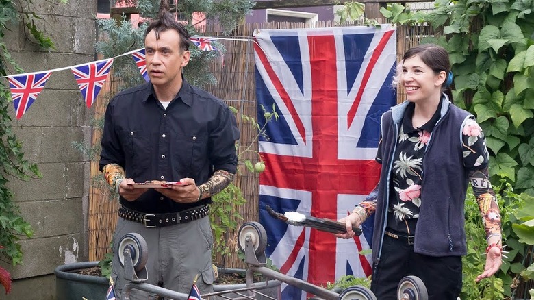 Fred Armisen and Carrie Brownstein as Dave and Kathy, preparing their punk BBQ in Portlandia.
