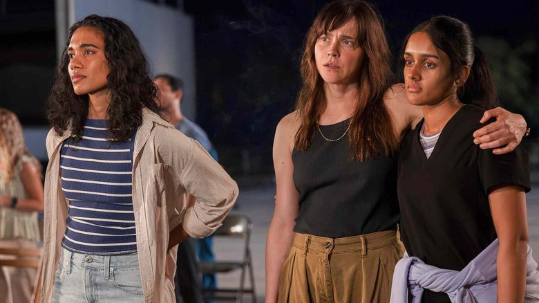 The doctors of the PItt watch fireworks in the Season 2 finale of The Pitt.