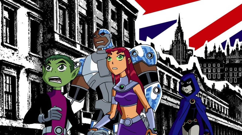 The Teen Titans walk through a cut out of England in Teen Titans.