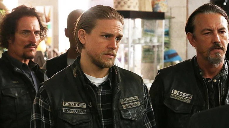Charlie Hunnam's Jax Teller surrounded by SAMCRO members on Sons of Anarchy