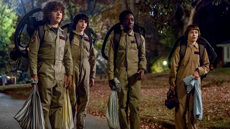 The Party as the Ghostbuster in Stranger Things.