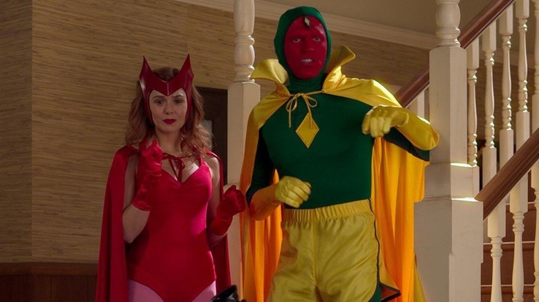 Eiizabeth Olsen as Wanda and Paul Bettany as Vision, in costume as Wanda and Vision in WandaVision.