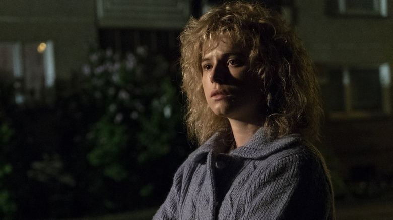 Lyudmilla Ignatenko on the street at night in Chernobyl