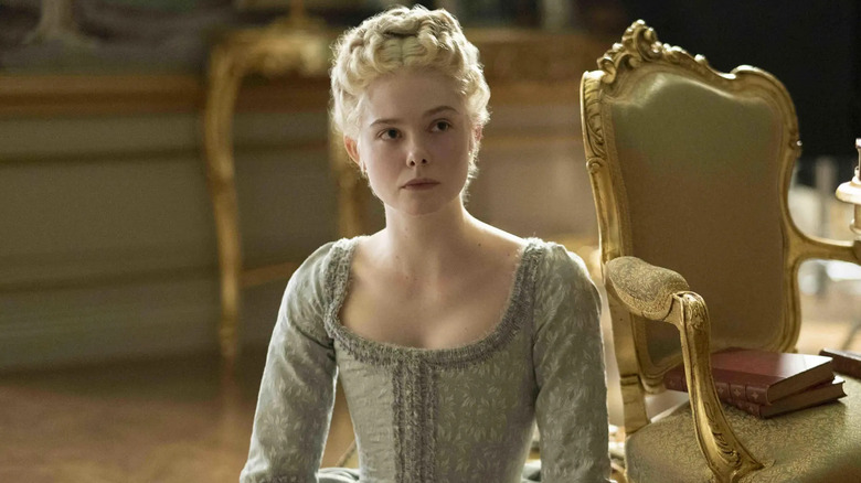 Catherine the Great sitting on the floor in The Great