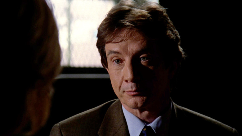 Sebastian Ballentine (Martin Short) stares at his interrogator in Law and Order Special Victims Unit.