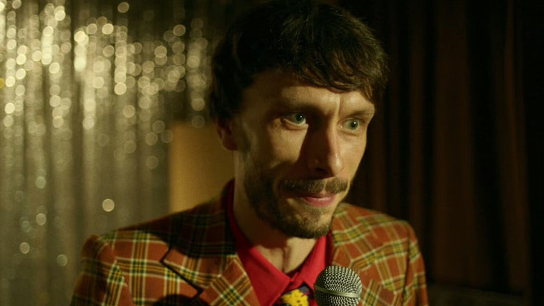 Richard Gadd as Donny performing stand-up in Baby Reindeer