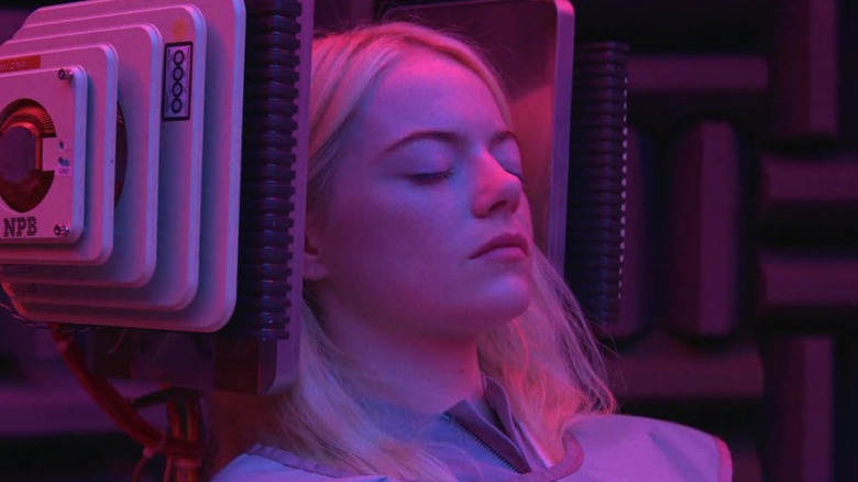 Emma Stone as Annie with her eyes closed in an analog machine in Maniac