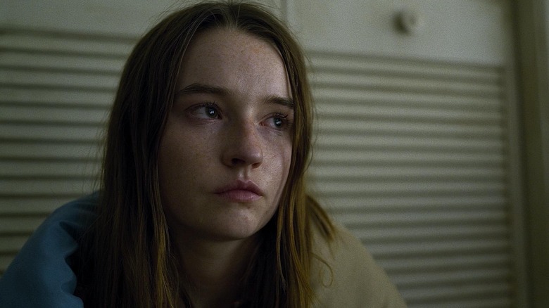 Kaitlyn Dever as Marie crying with a blanket around her in Unbelievable