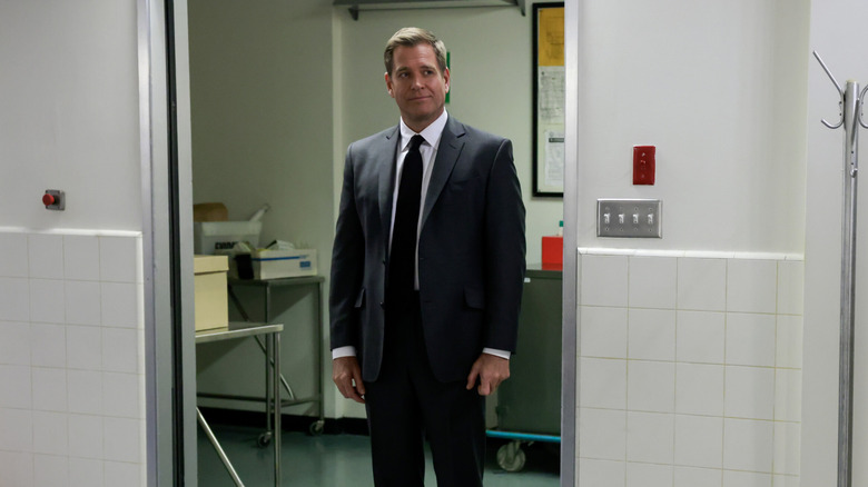 Michael Weatherly's as Tony DiNozzo standing in a doorway on NCIS