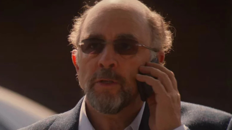 Richard Schiff's Harper Dearing speaking on the phone on NCIS