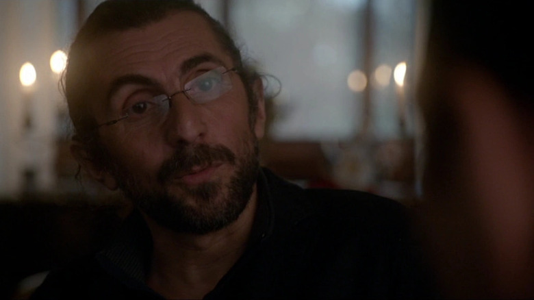 Alex Veadov's Sergei Mishnev with a beard and glasses on NCIS