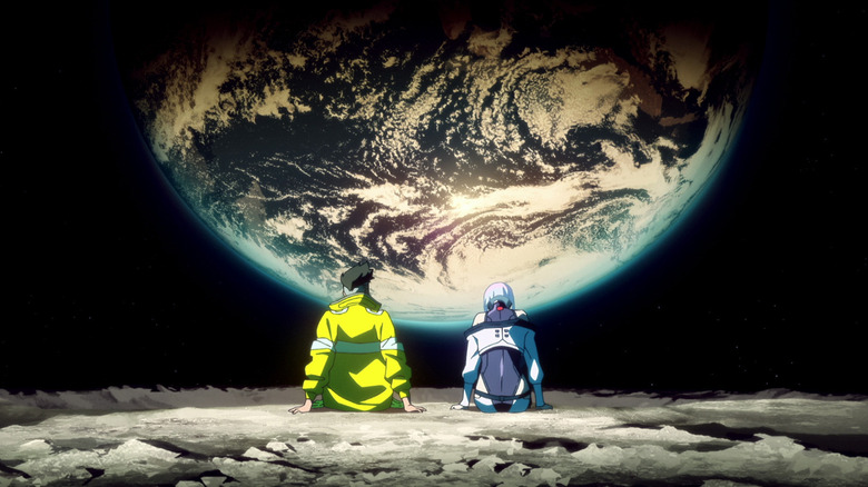 Dave Martinez and Lucy Kushinada sit on the Moon observing the Earth in Cyberpunk: Edgerunners