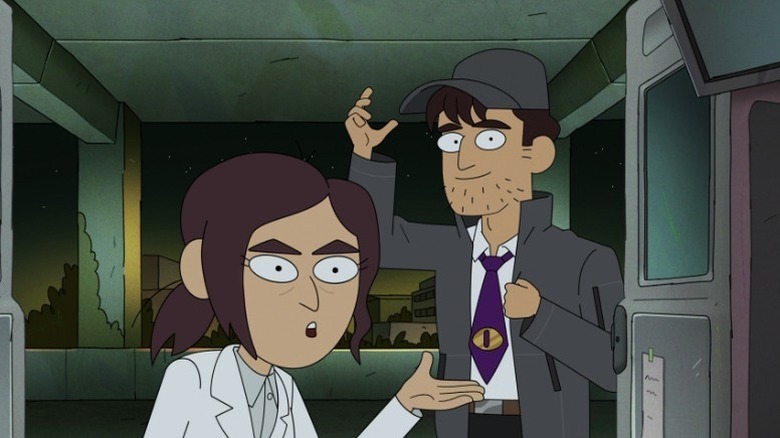 Reagan Ridley (Lizzy Caplan) and Brett Hand (Clark Duke) sit in an abandoned facility in Inside Job