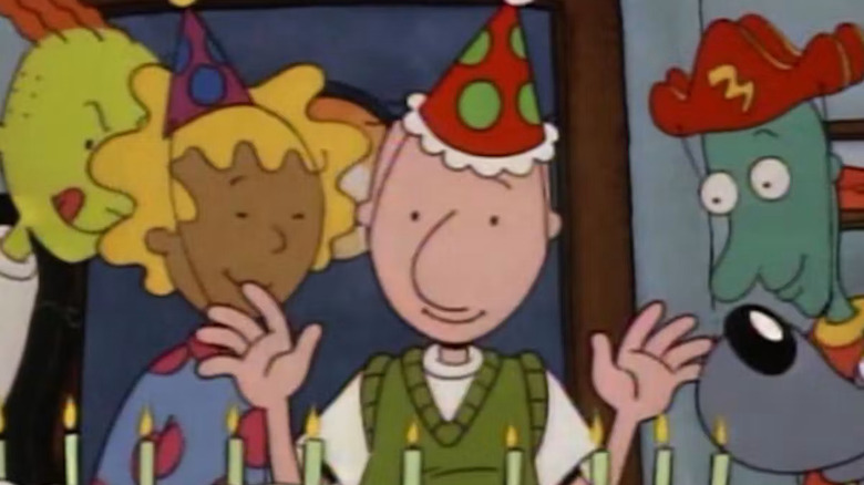 Doug celebrates his birthday with a cake and friends in Doug.