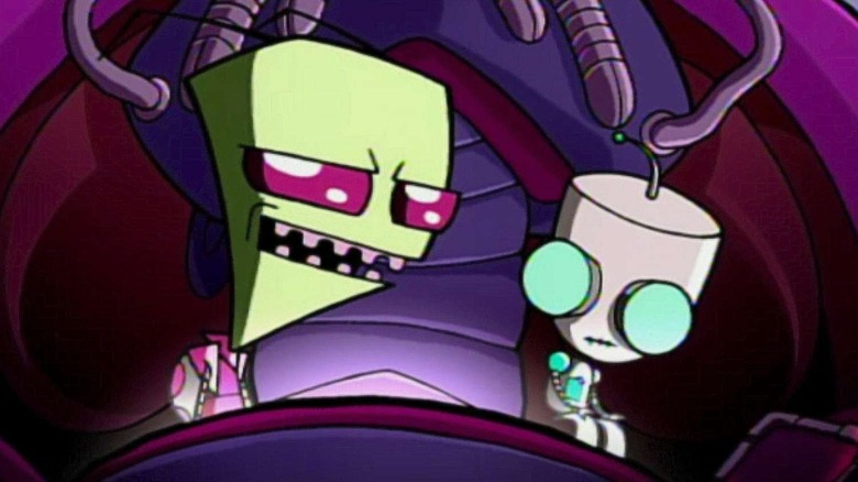 Zim and GIR sit next to each other in Invader Zim.