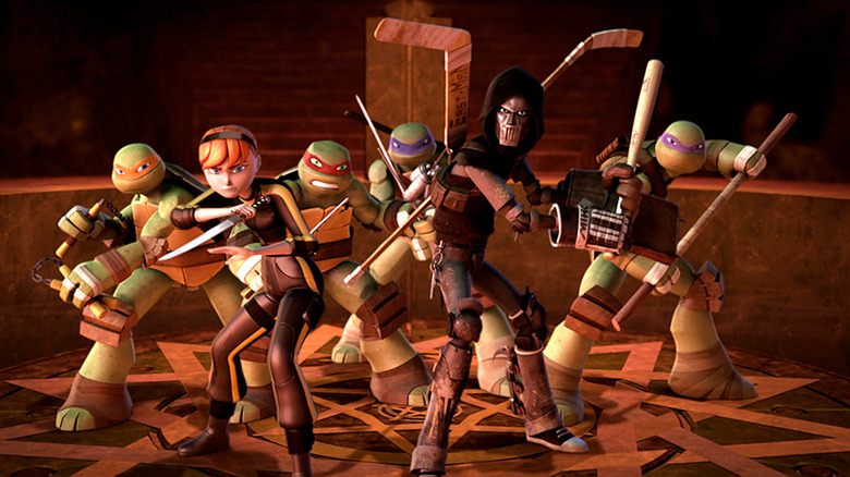 April O'Neill and Casey Jones square off with the Turtles in Teenage Mutant Ninja Turtles.