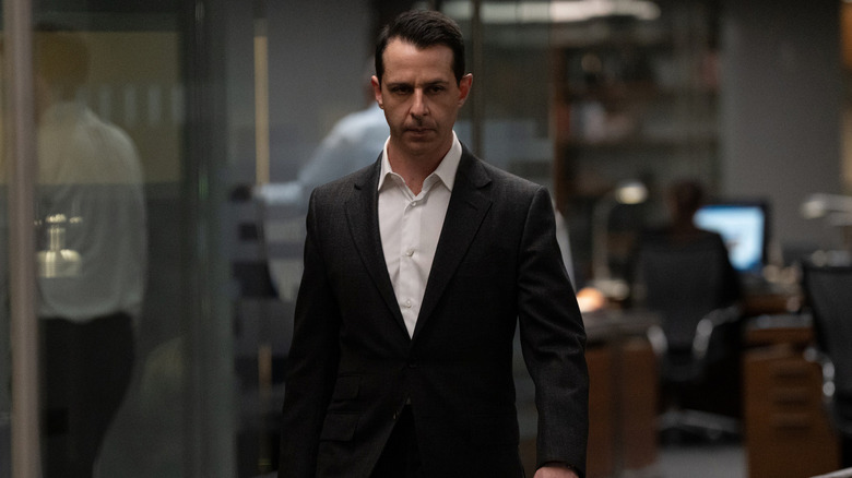 Jeremy Strong as Kendall Roy, walking through ATN in Succession.