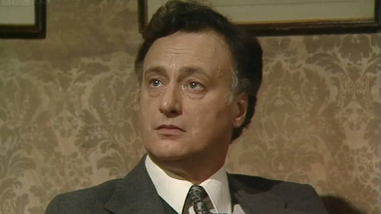 Paul Eddington as Jim Hacker, looking upward in Yes Minister.