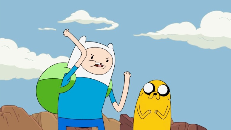 Finn shaking his fists angrily while Jake looks at him on Adventure Time S3E2