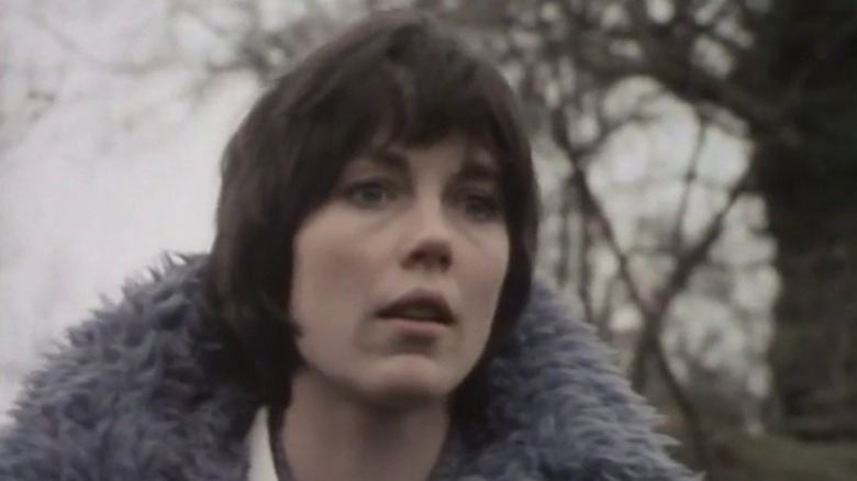 Jenny Richards standing with a concerned expression on Survivors S1E2