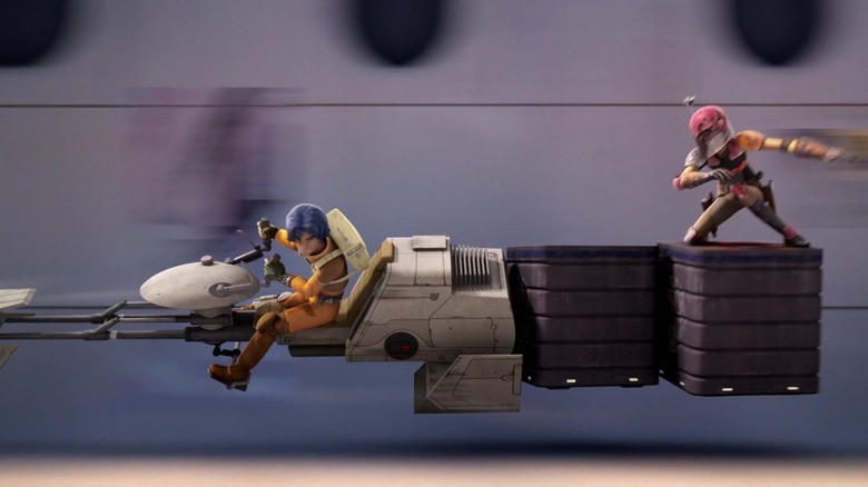 Ezra and Sabine escape on a speeder in Star Wars Rebels