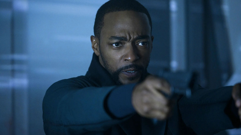 Takeshi Kovacs (Anthony Mackie) aims a pistol on Altered Carbon