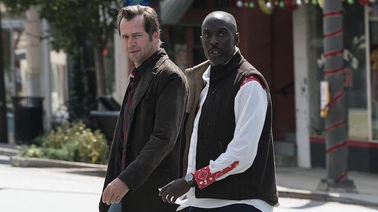 James Purefoy as Hap walking next to Michael Kenneth Williams as Leonard in Hap and Leonard