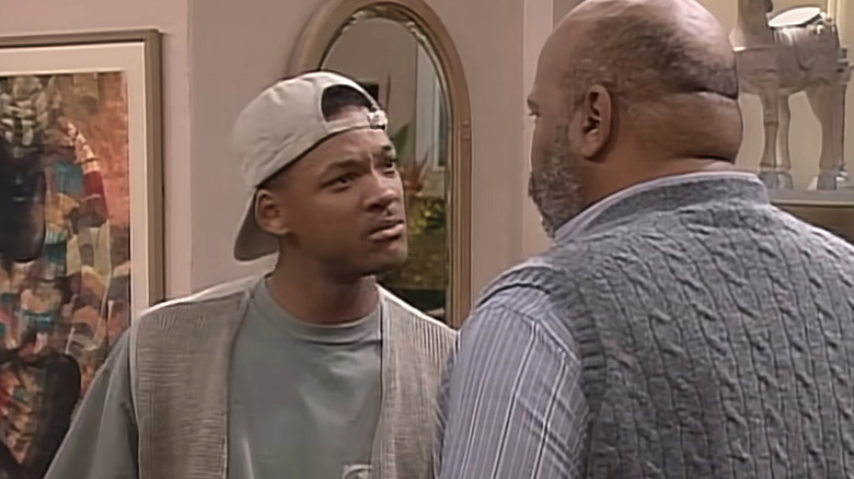 Will Smith as a fictional version of himself and James Avery as Uncle Phil on The Fresh Prince of Bel Air.