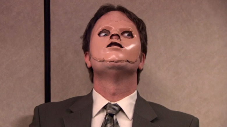 Rainn Wilson as Dwight Schrute, wearing a cut-off mask on The Office.