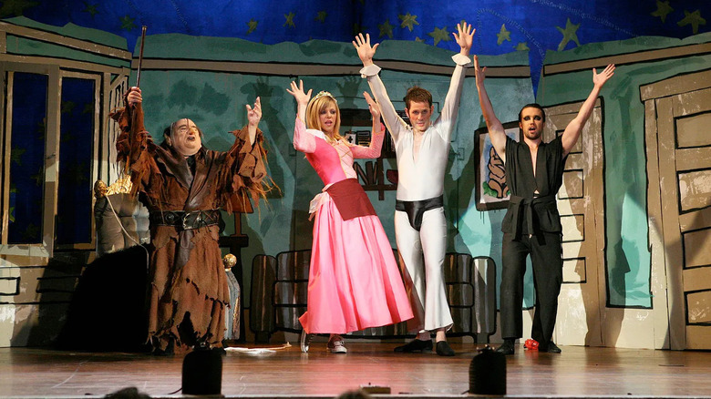 Frank, Dee, Dennis, and Mac strike a pose on stage in the production of The Nightman Cometh on It's Always Sunny in Philadelphia.