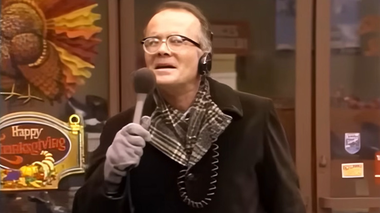 Richard Sanders as Les Nessman, giving a report in WKRP in Cincinnati.
