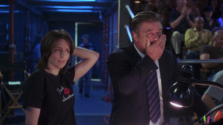 Jack Donaghy laughs next to Liz Lemon in "30 Rock"