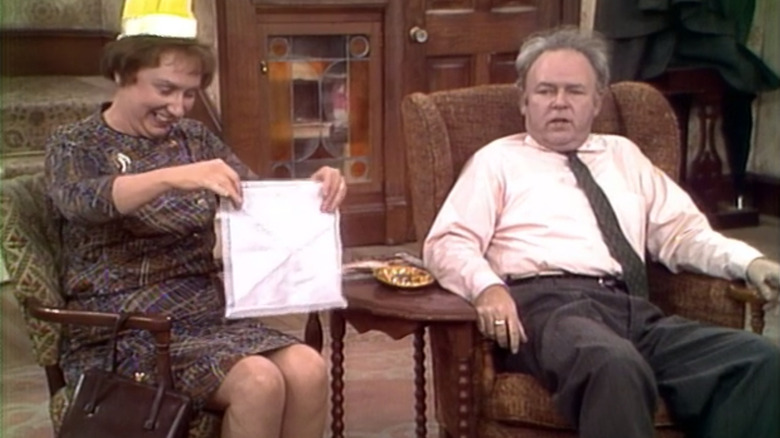 Archie and Edith Bunker sit together in "All in the Family"