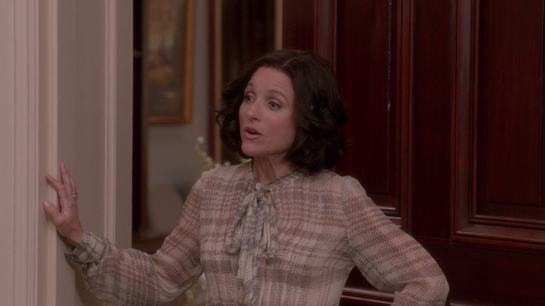 Selina Meyer stands in her office doorway in "Veep"