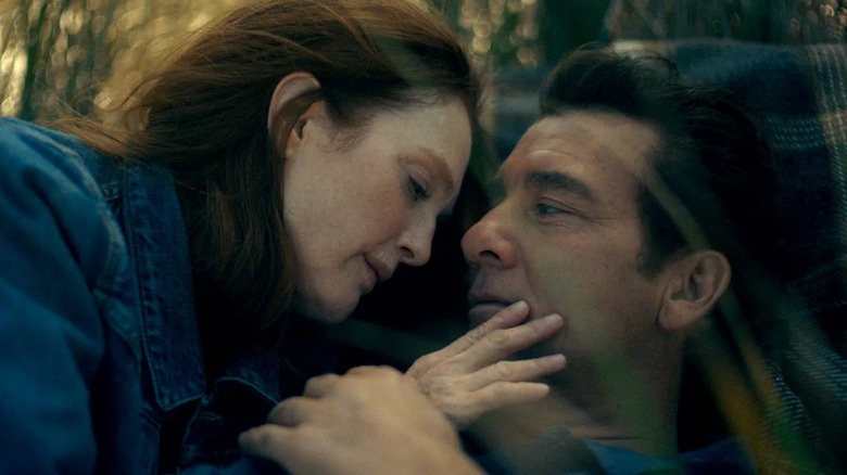 Julianne Moore as Lisey Landon lays next to Clive Owen as Scott Landon on Lisey's Story