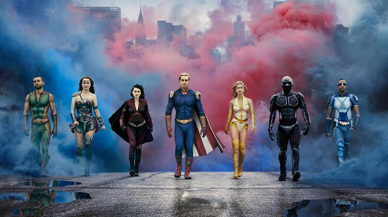 The Deep, Maeve, Stormfront, Homelander, Starlight, Black Noir, and A-Train walking together through smoke in The Boys