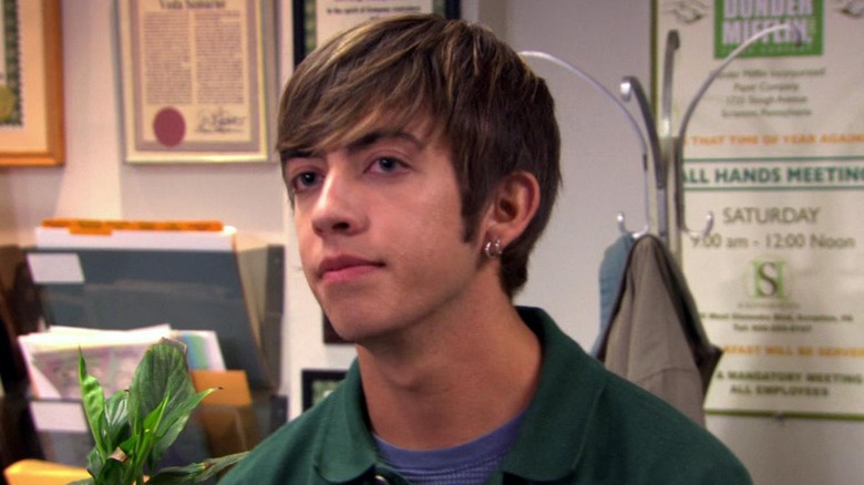 Kevin McHale as the delivery driver, looking displeased on "The Office."